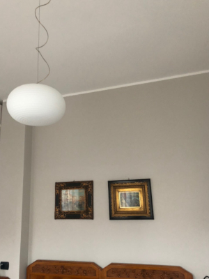 Lampada Fontana Arte nella camera padronale